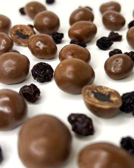 PASAS AL RON CUBIERTAS CON CHOCOLATE